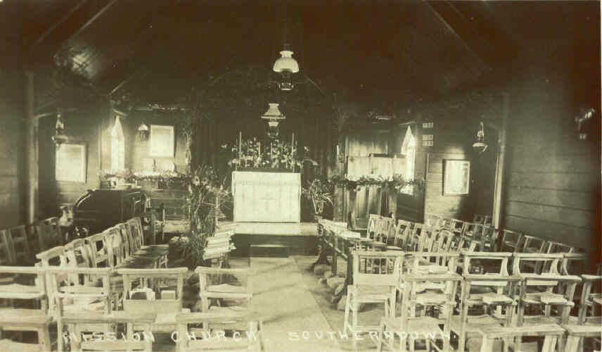 Interior of Southerndown Mission Room with oil lamps for lighting